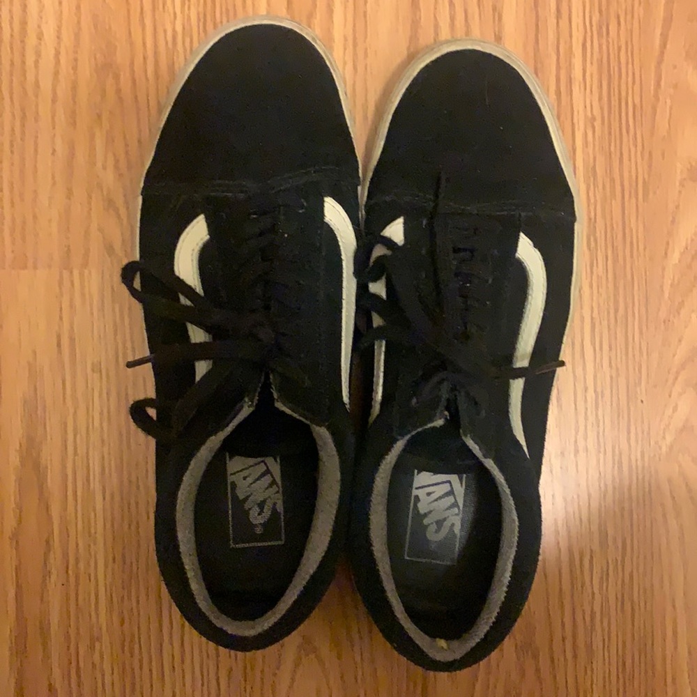 Black Vans sneakers